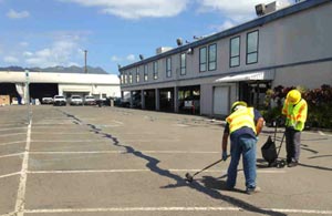 Asphalt crack filling in progress