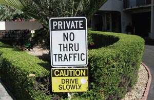 Private traffic and caution signs