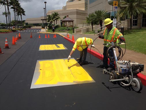 Parking lot maintenance at Queen’s Medical Center West